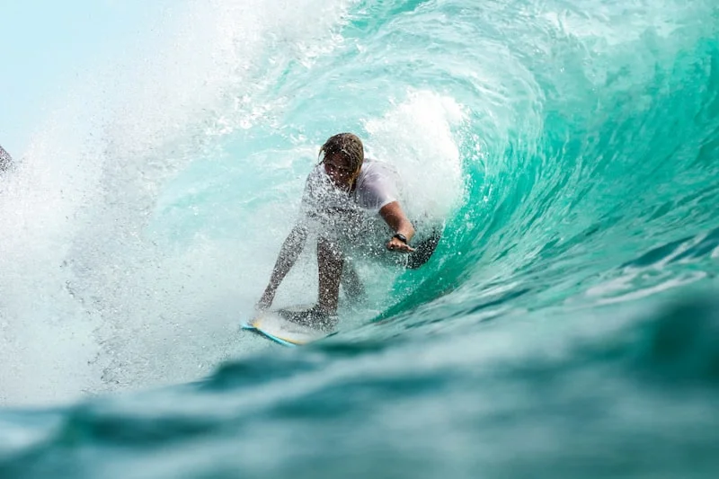 Surfing in Uluwatu, Bali